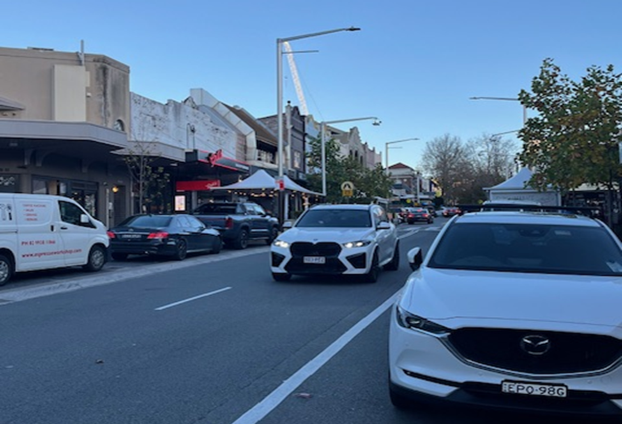 Willoughby Road today — cars, vans and buses dominate the street